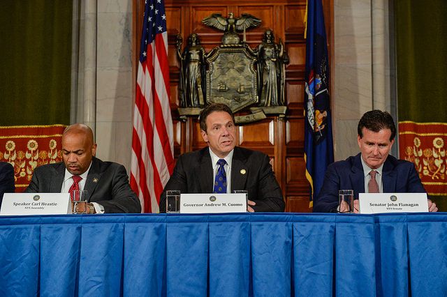 Assembly Leader Carl Heastie, Governor Andrew Cuomo, and Senate Leader John Flanagan, in 2015